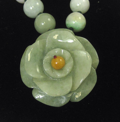 Appraisal: MULTI-COLOR JADE PENDANT NECKLACE strung with green jade beads and