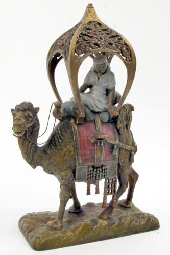 Appraisal: A COLD-PAINTED SPELTER FIGURE An Arab in traditional costume riding