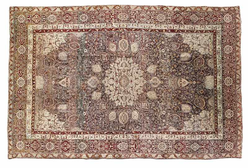 Appraisal: An Indo-Persian Agra wool carpet Circa with central stylized central