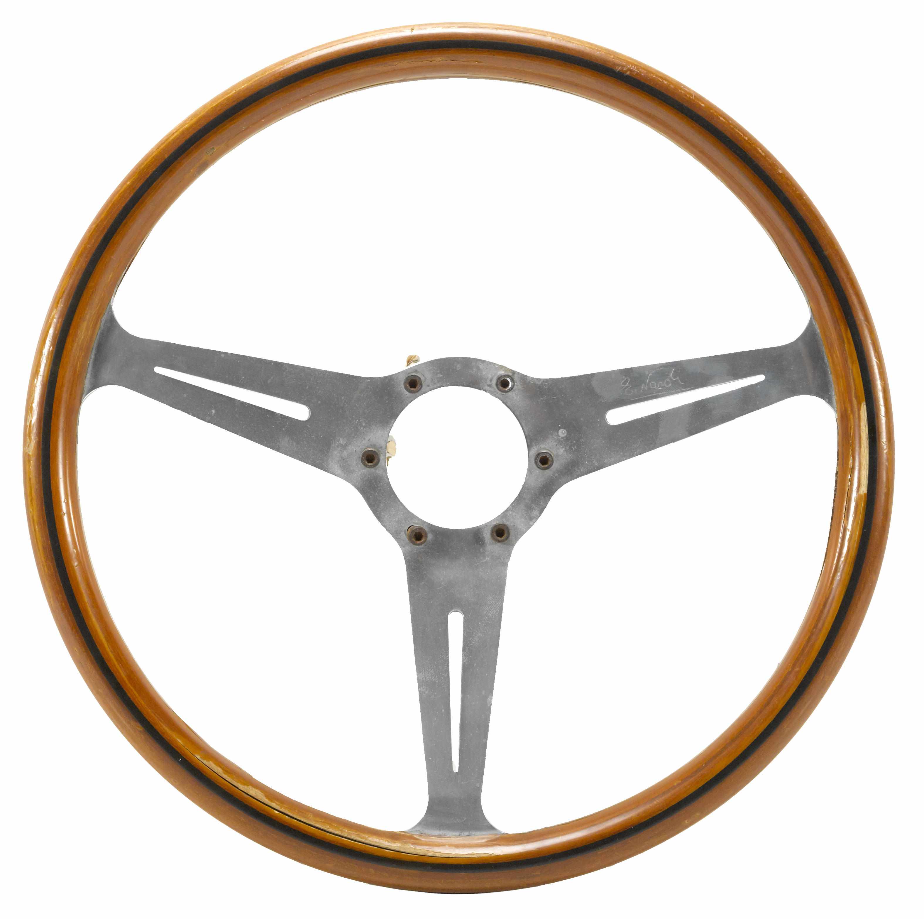 Appraisal: A Nardi wood-rimmed three-spoke steering wheel used showing wear and