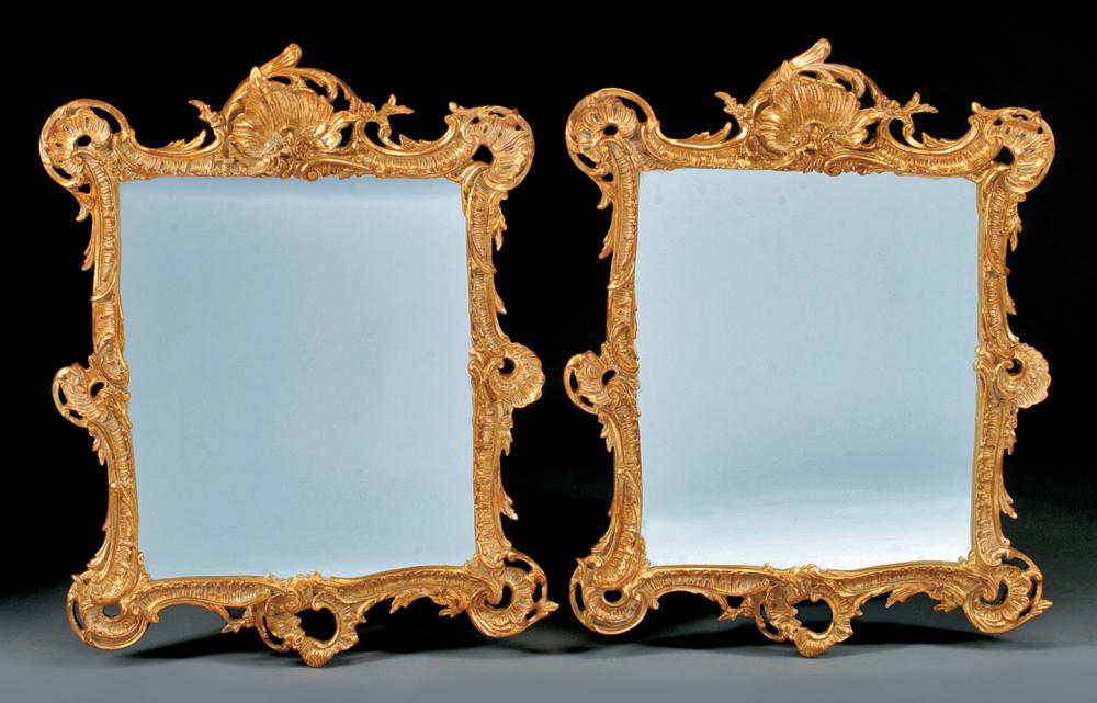 Appraisal: Pair of Italian Rococo Carved and Gilded Mirrors probably th