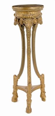 Appraisal: A gilt torchere in Adam style the tripod supports with