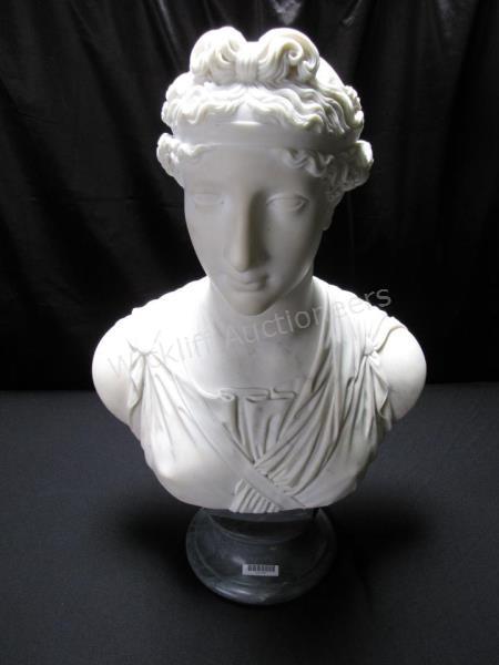 Appraisal: A marble bust depicting woman in classic Roman empire attire