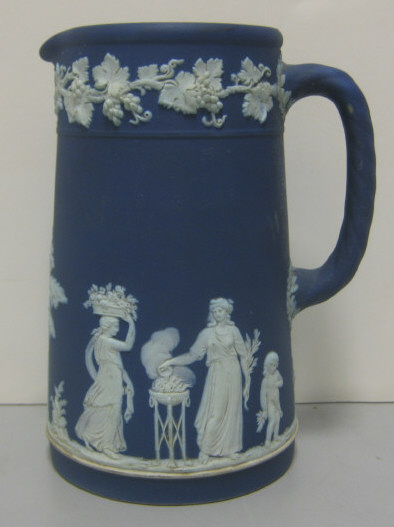 Appraisal: WEDGWOOD CIRCA A dark blue dip and white jasperware pitcher