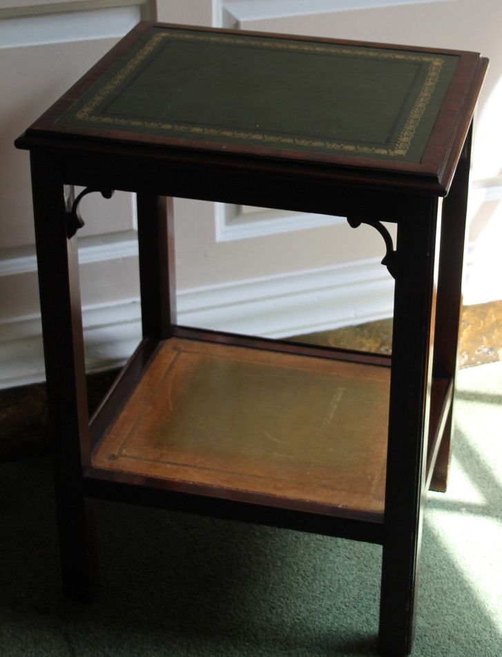 Appraisal: A mahogany two tier occasional table the rectangular top with