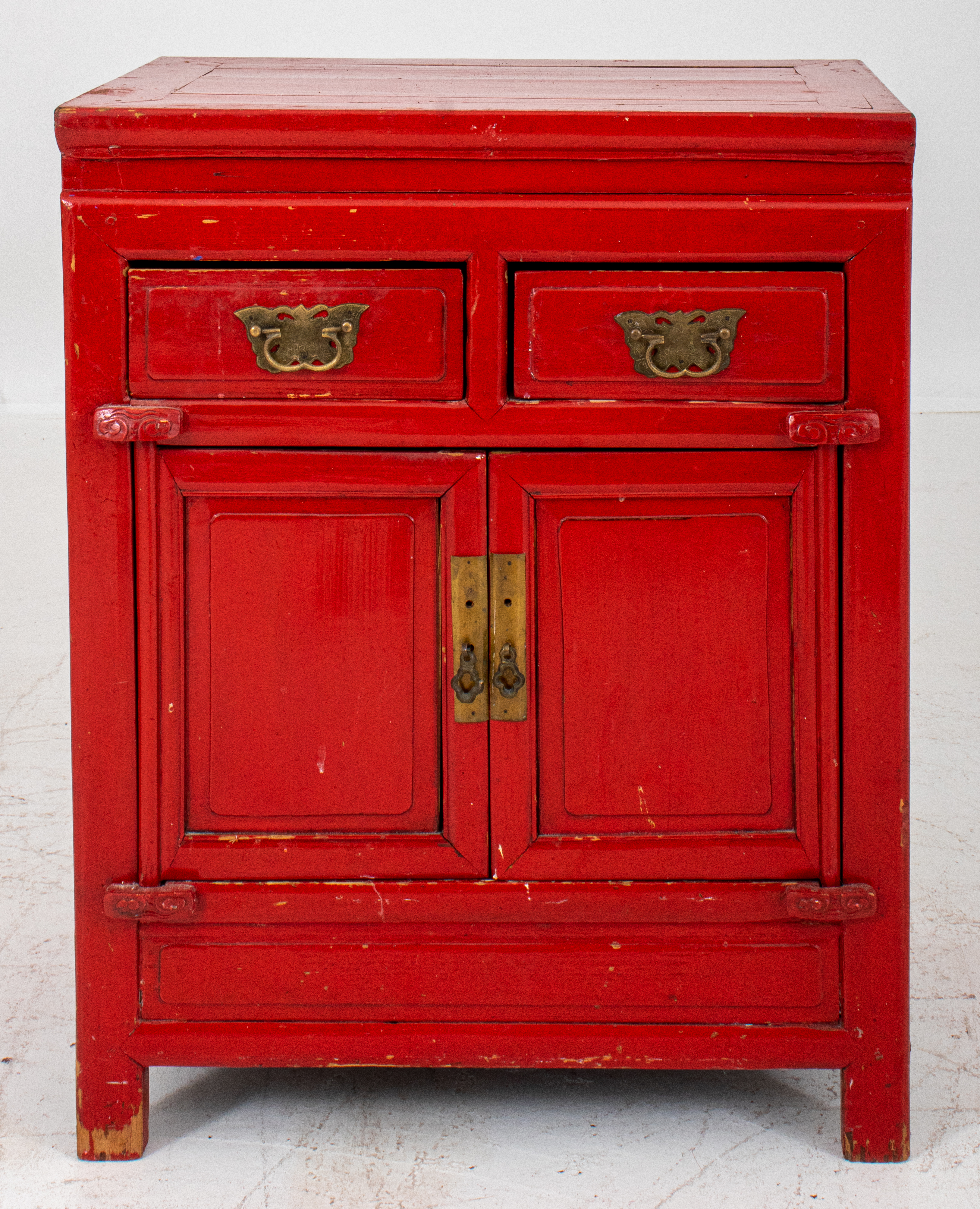 Appraisal: CHINESE RED LACQUERED WOOD CABINET Chinese red lacquered wood cabinet