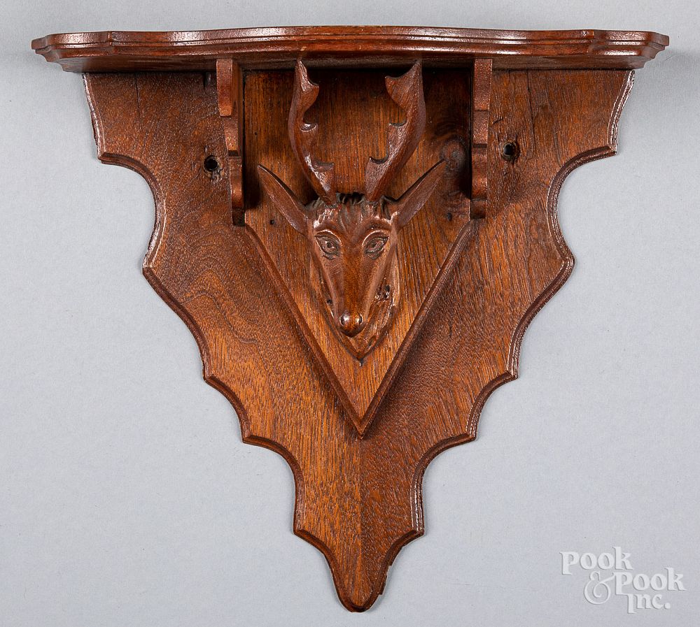 Appraisal: Walnut walnut hanging shelf with carved deer Victorian walnut hanging