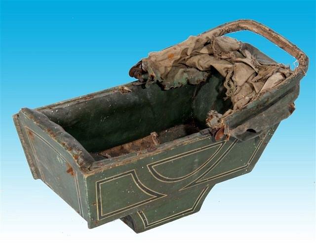 Appraisal: A TH CENTURY GREEN PAINTED DOLL'S PRAM BODY with leatherette