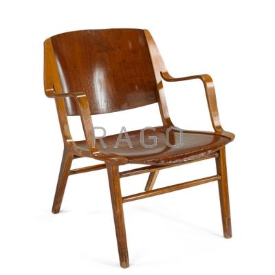 Appraisal: PETER HVIDT FRITZ HENINGSTEN Lounge chair Denmark s Laminated birch