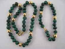 Appraisal: A malachite necklace and bracelet interspaced with yellow metal tests