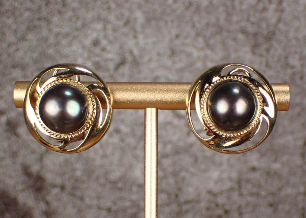 Appraisal: PAIR OF BLACK PEARL AND FOURTEEN KARAT GOLD EARRINGS each