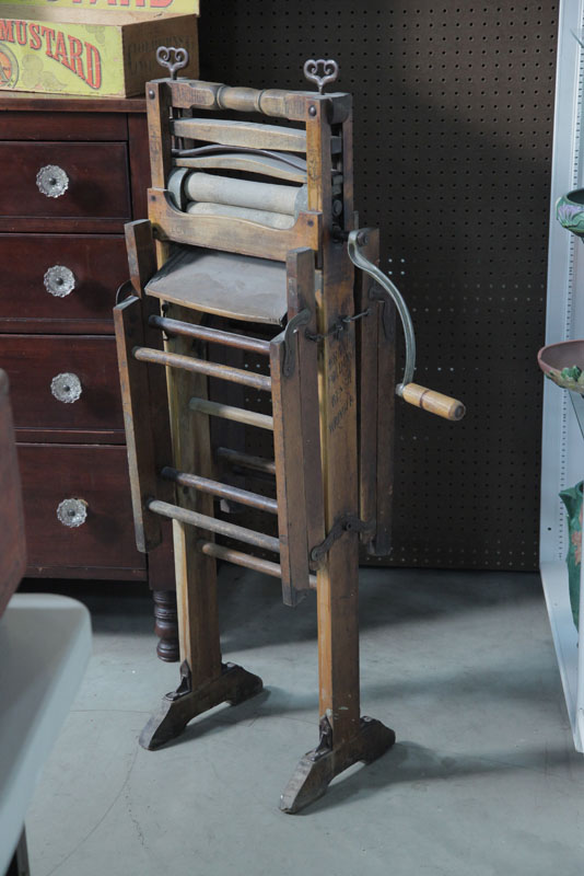 Appraisal: ANCHOR BRAND LAUNDRY RINGER Folding bench wringer marked ''Anchor Brand