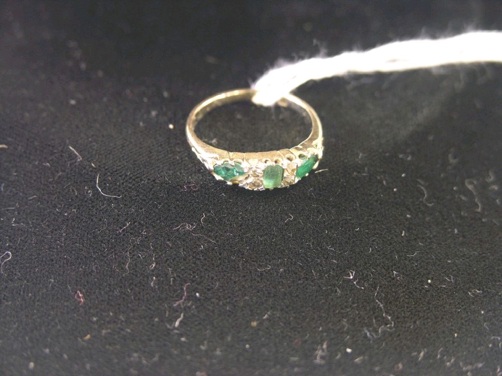 Appraisal: A Victorian ct gold diamond and emerald half-hoop ring three