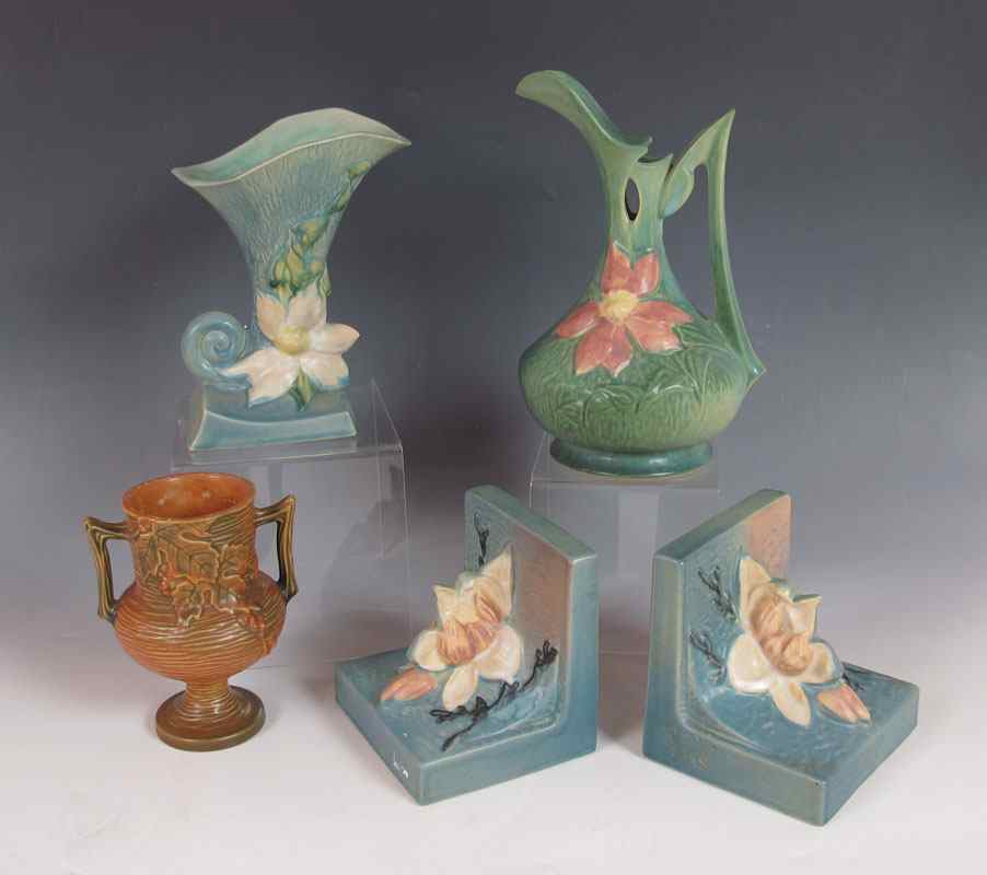 Appraisal: PIECES ROSEVILLE POTTERY To include - Magnolia bookends of blue