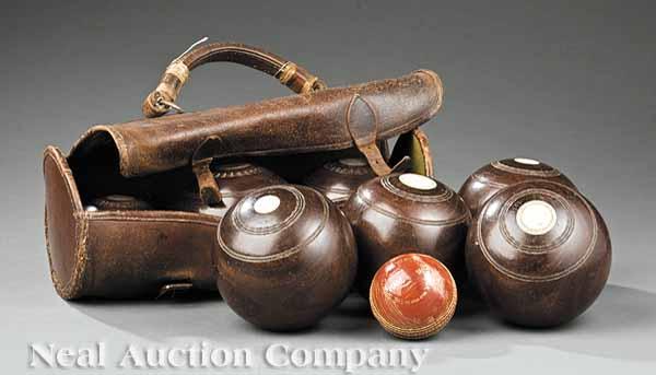 Appraisal: A Group of Seven Antique Lignum Vitae Lawn Bowling Balls