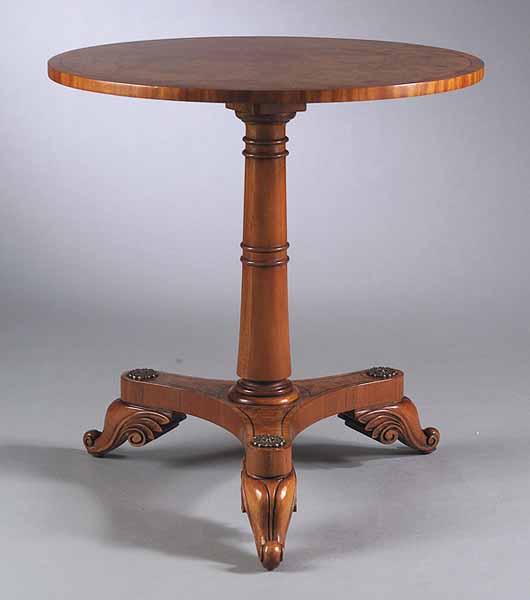 Appraisal: A Biedermeier-Style Burlwood Gu ridon with turned standard on an