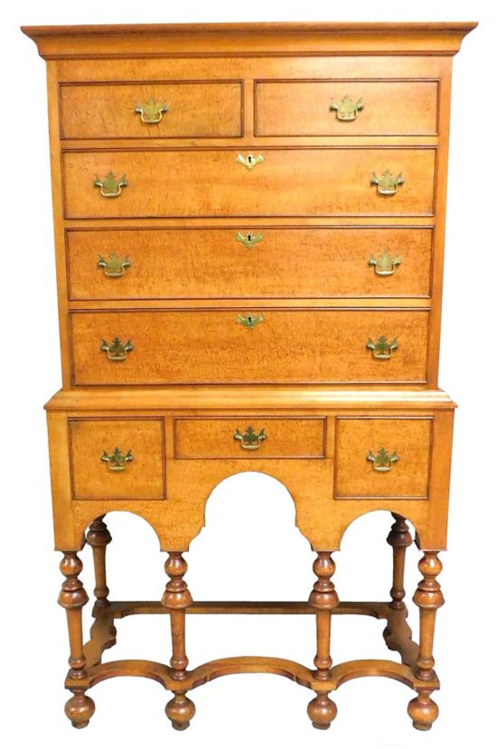 Appraisal: Reproduction high chest figured maple veneer two short drawers over