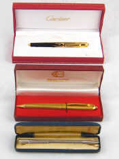 Appraisal: A Cartier gold plated fountain pen together with a Best