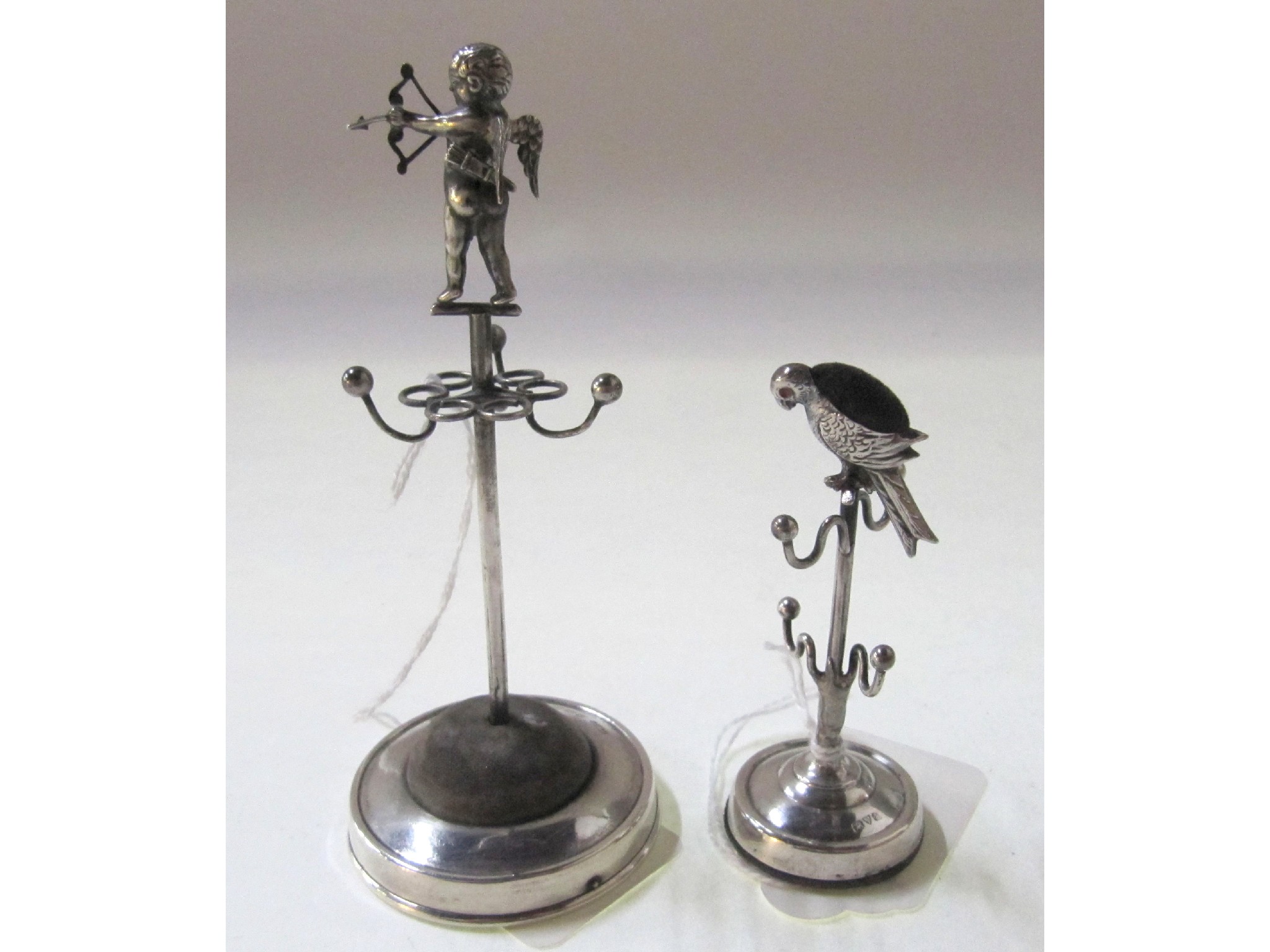 Appraisal: A lot comprising a silver hatpin stand Birmingham and a