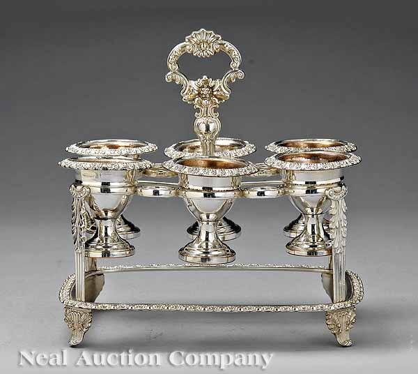 Appraisal: A Regency-Style Sheffield Silverplate Six-Cup Egg Stand rectilinear frame with