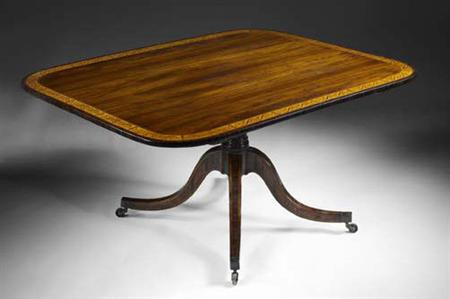 Appraisal: A Regency rosewood breakfast table circa the oblong top with