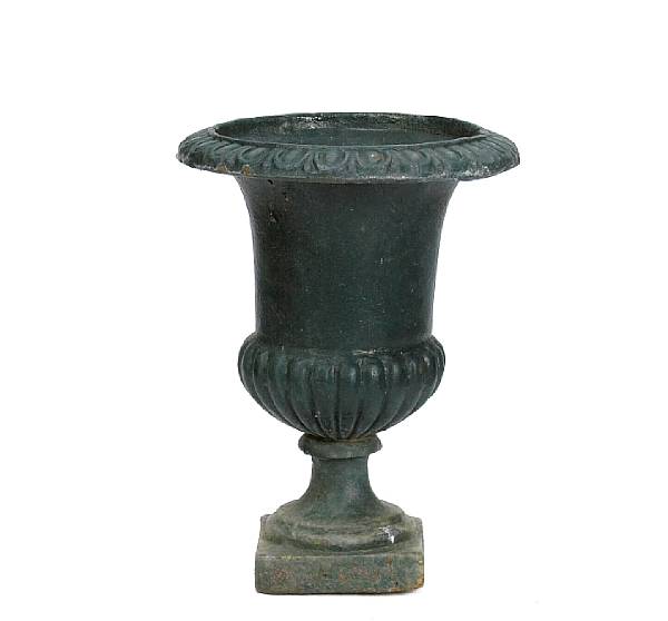 Appraisal: A group of four Neoclassical style cast iron campana form