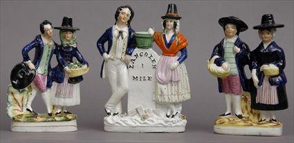 Appraisal: THREE STAFFORDSHIRE FIGURE GROUPS Each modeled as a couple the