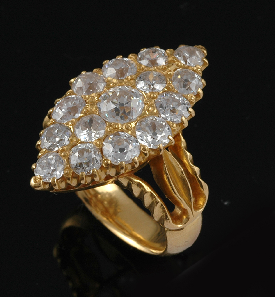 Appraisal: A DIAMOND PLAQUE RING The marquise shaped panel having a