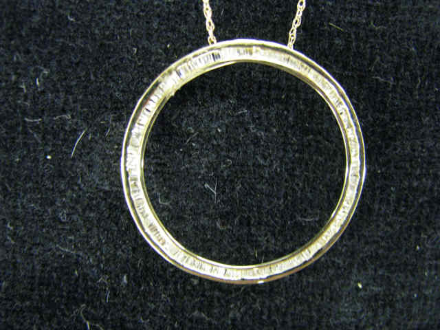 Appraisal: Diamond Circle Pendant baguette diamonds totaling carat in k yellow