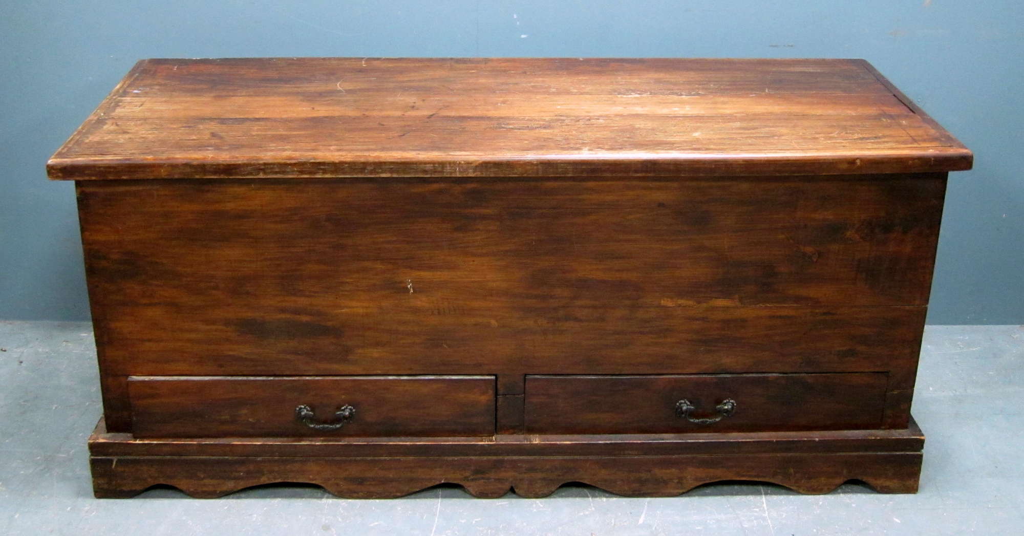 Appraisal: Wooden stained coffer with two drawers to base with shaped