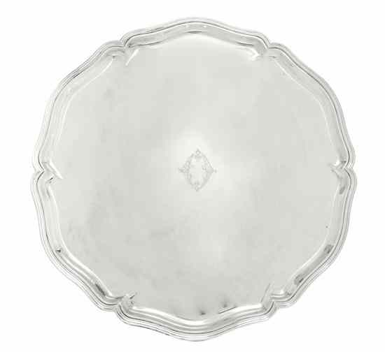 Appraisal: A Continental Silver Tray of shaped circular form centered with