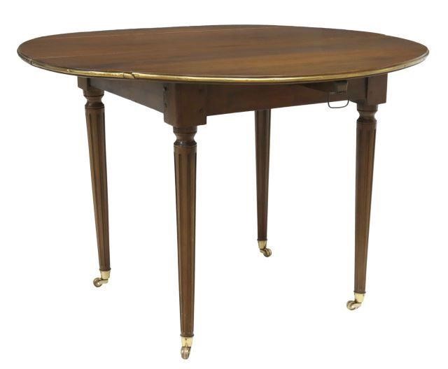 Appraisal: French Louis XVI style walnut drop-side extension table late th