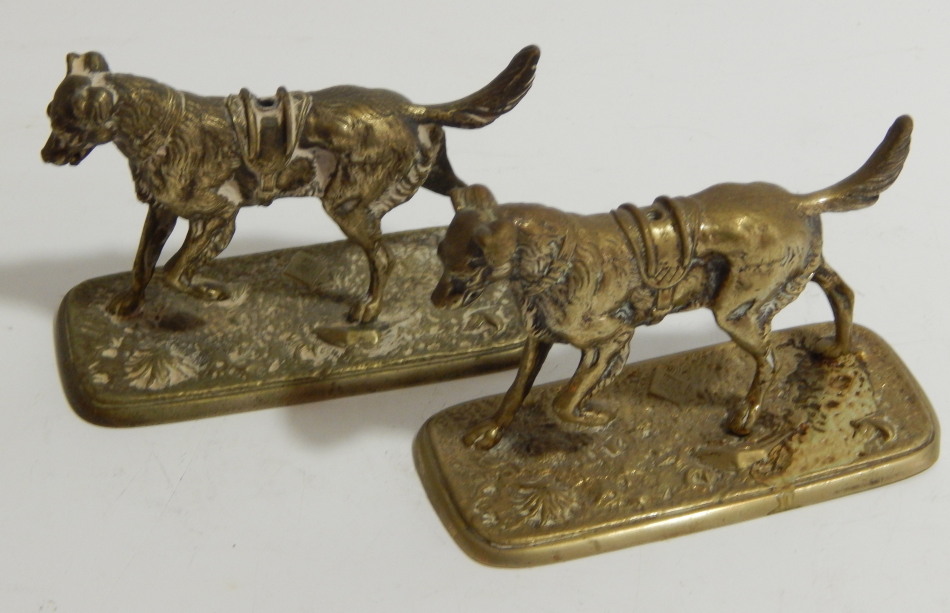 Appraisal: Two late thC cast nickel dogs lacking silver plate with