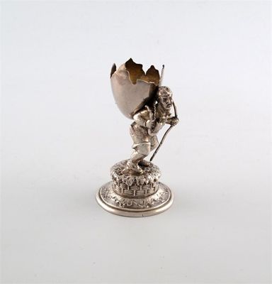 Appraisal: A continental figural egg cup import marks for London in