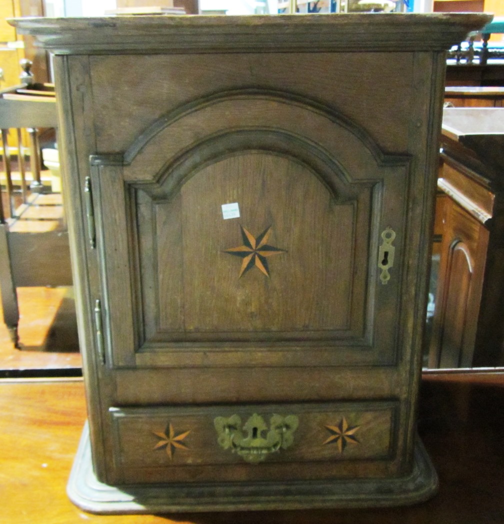 Appraisal: A th century oak small side cabinet with cupboard and