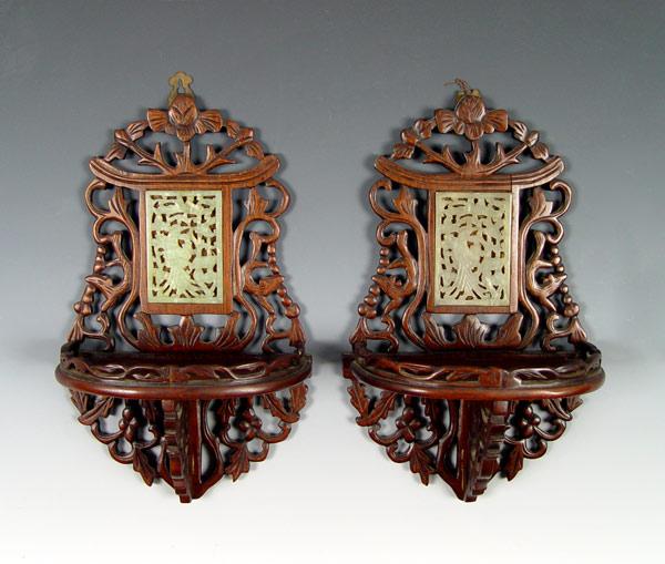 Appraisal: PAIR CHINESE CARVED WALL BRACKETS WITH JADE INSERTS Pierce carved