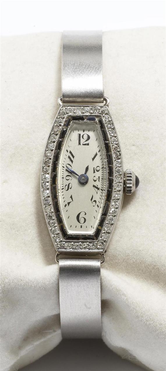 Appraisal: AN ONYX AND DIAMOND WRISTWATCH circa Platinum and white gold