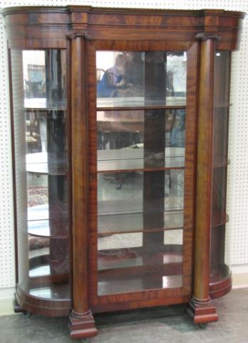 Appraisal: Royal Furniture mahogany curved glass china cabinet Corinthian column front