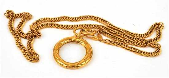 Appraisal: A PENDANT AND CHAIN BY CHANEL The tight curb link