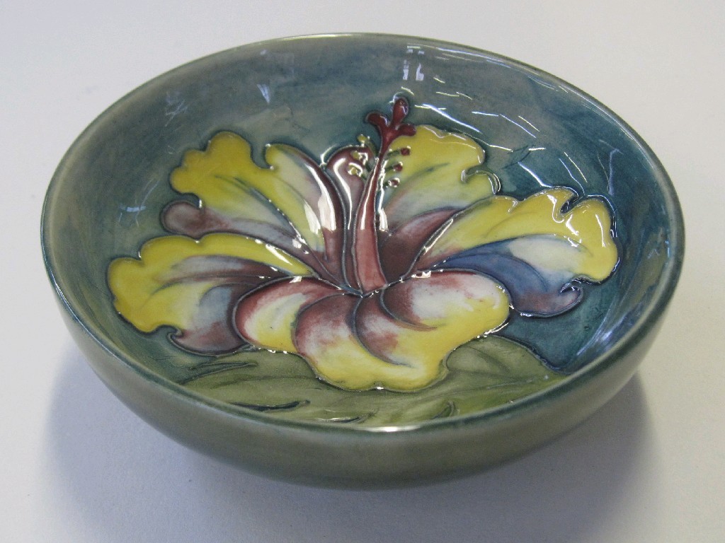 Appraisal: Moorcroft 'Hibiscus' footed bowl on green ground diameter