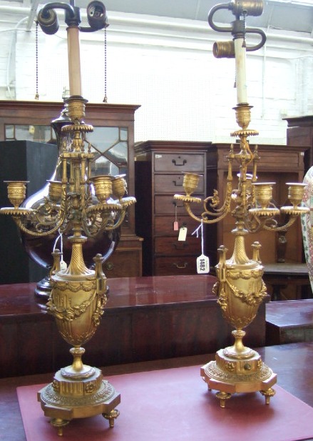 Appraisal: A pair of French gilt bronze five light candelabra of