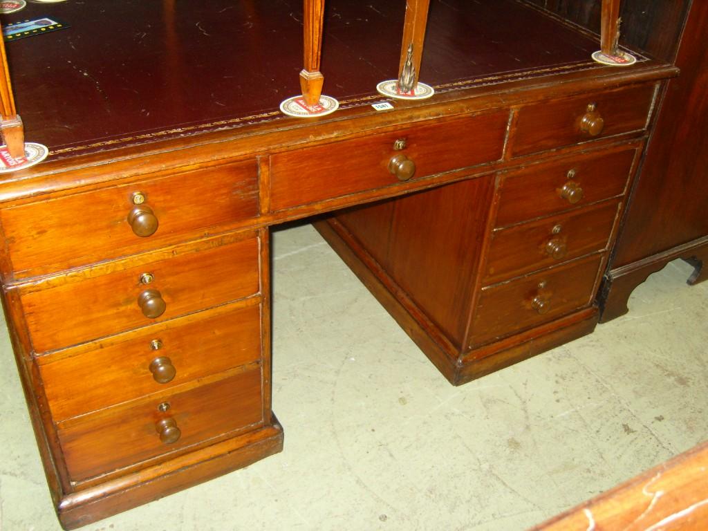 Appraisal: A th century mahogany pedestal desk of substantial form fitted