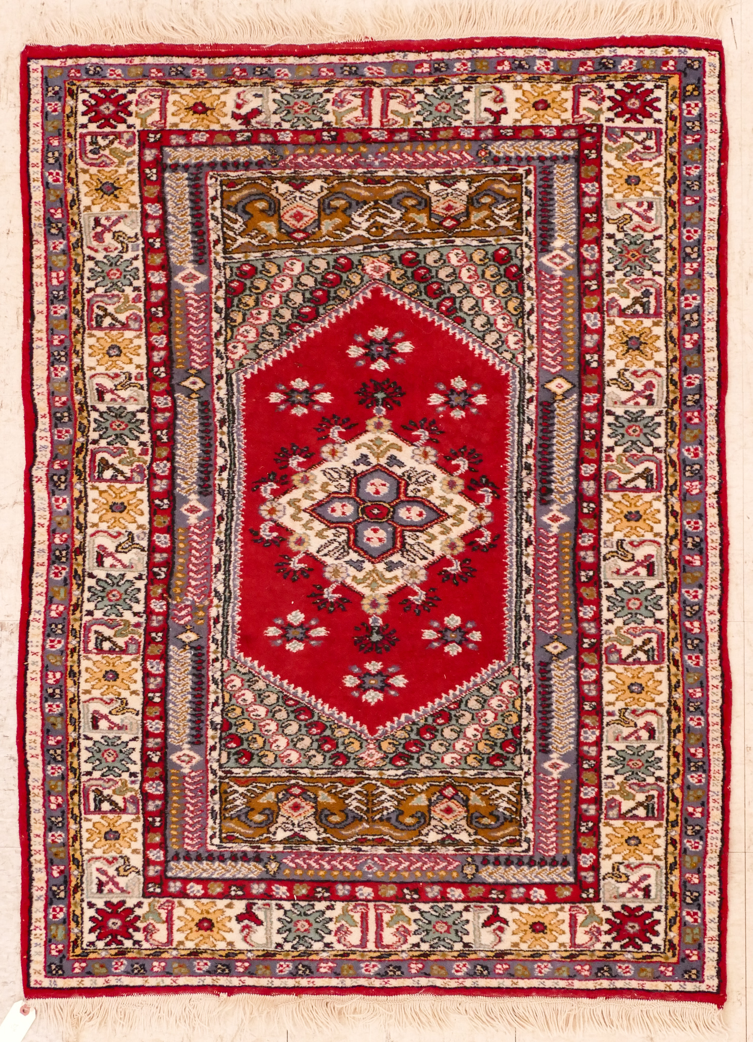 Appraisal: Caucasian Multi-Colored Oriental Rug 'x ' '' Unusual red medallion