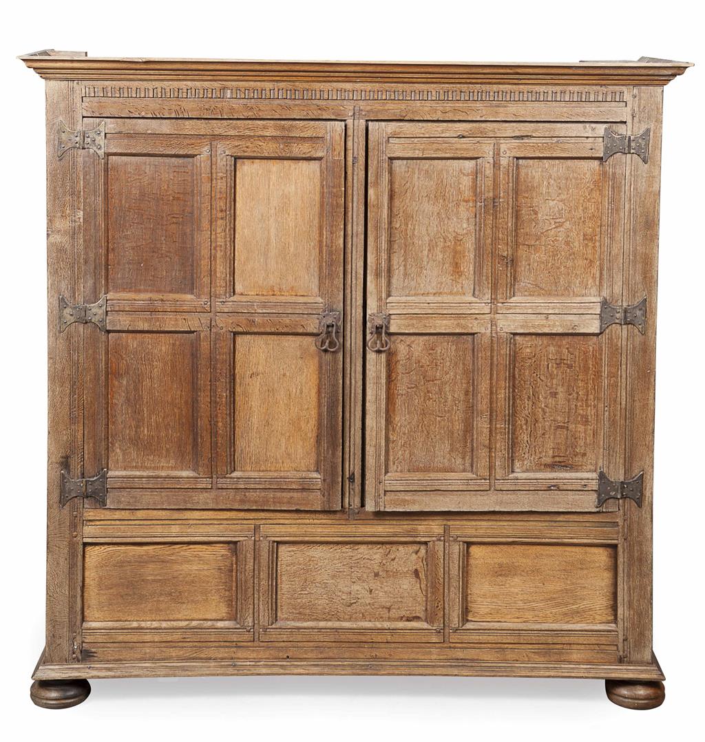 Appraisal: GEORGIAN OAK LIVERY CUPBOARD TH CENTURY AND LATER the moulded