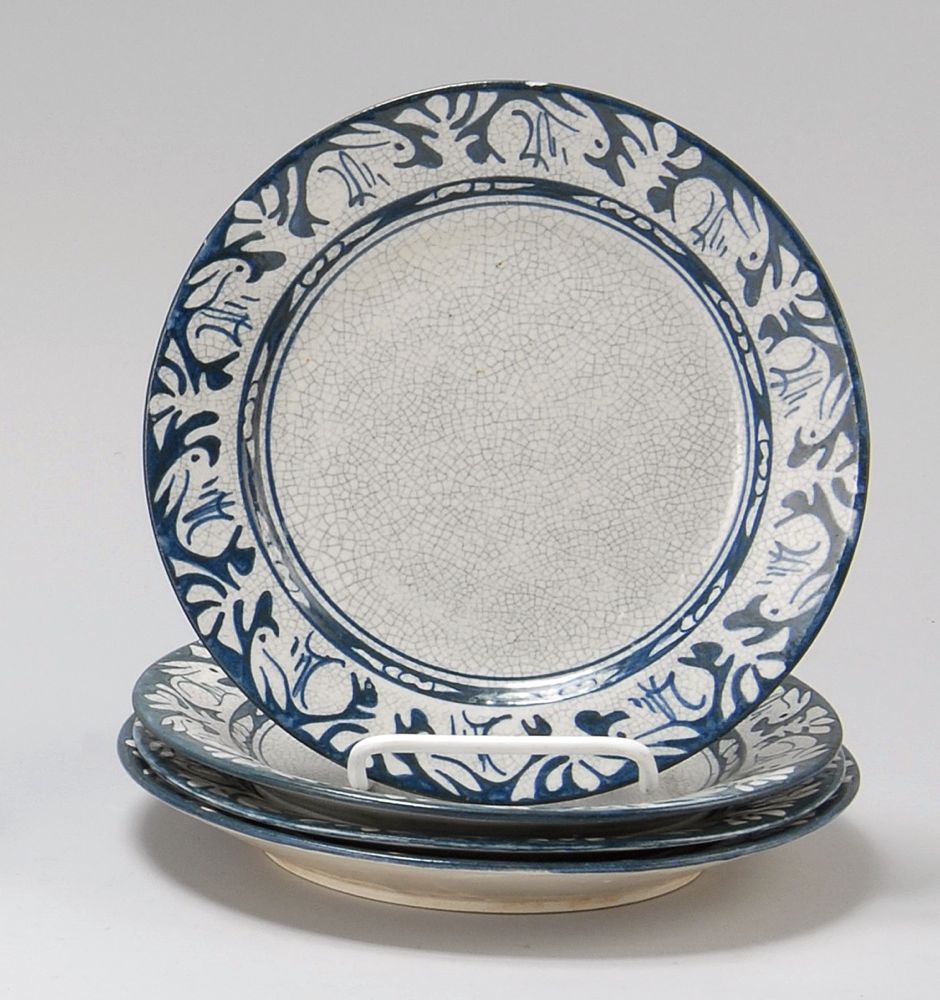 Appraisal: FOUR DEDHAM POTTERY PLATES In Rabbit pattern Blue marks Diameter