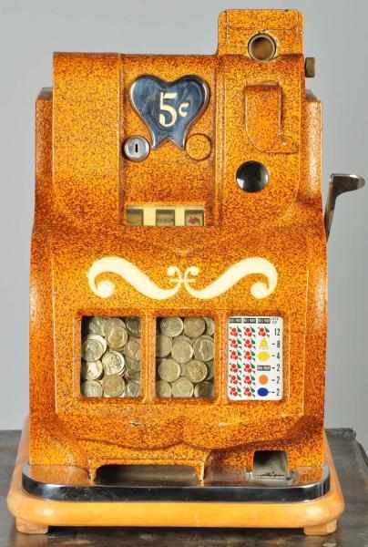 Appraisal: Mills QT Twin Jackpot Slot Machine Description Working Brown spatter