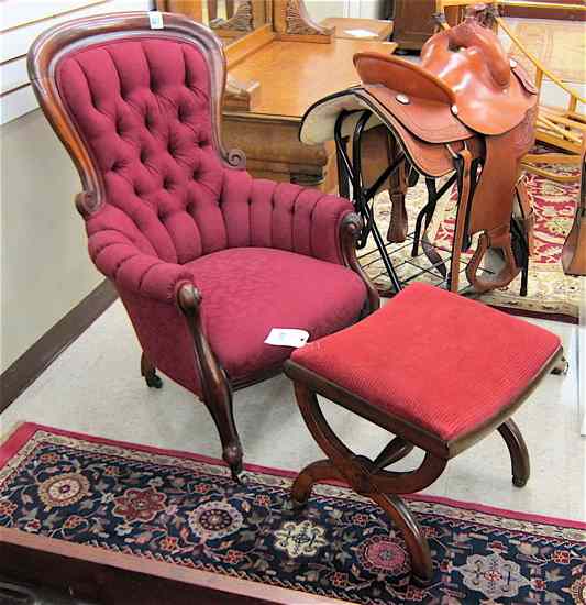 Appraisal: VICTORIAN ARMCHAIR AND FOOTSTOOL English th century with burgundy upholstery