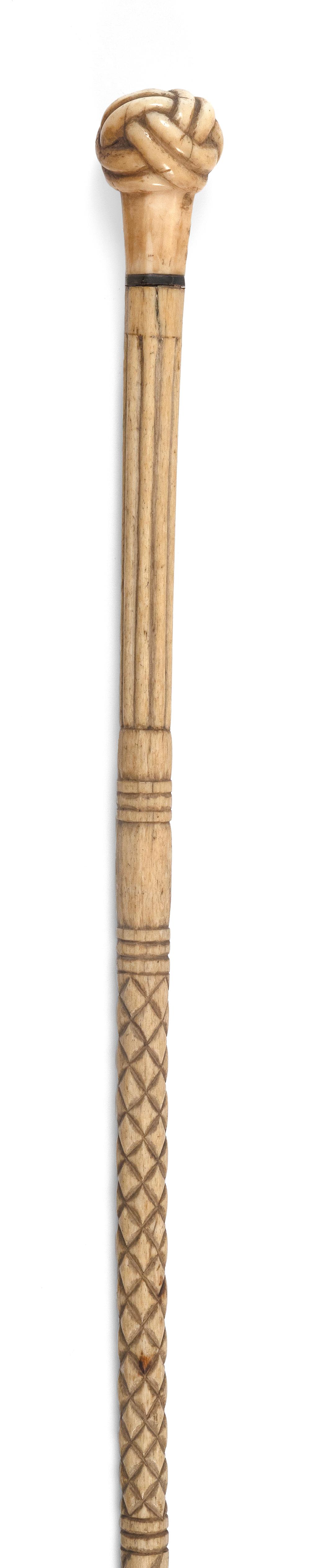 Appraisal: WHALE IVORY AND WHALEBONE CANE TH CENTURY LENGTH WHALE IVORY