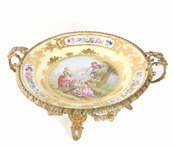 Appraisal: A Sevres style porcelain and gilt bronze mounted centerpiece height