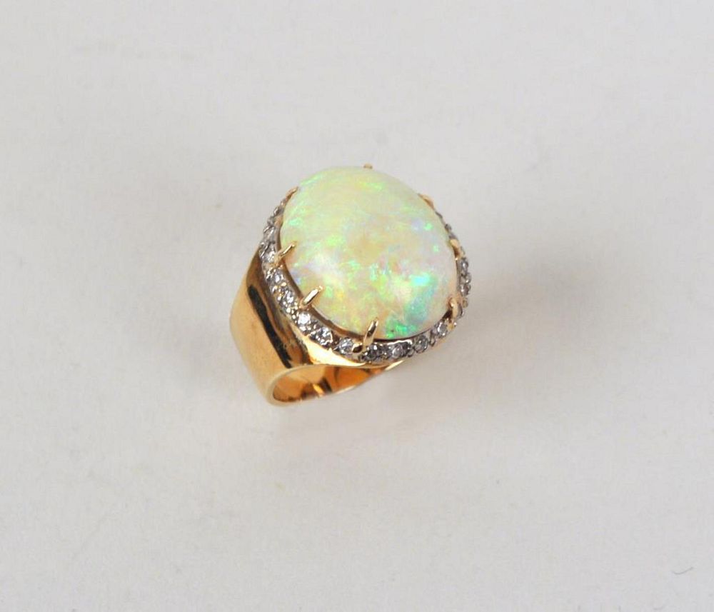 Appraisal: K Gold Opal Diamond Ring featuring a cabochon opal surrounded